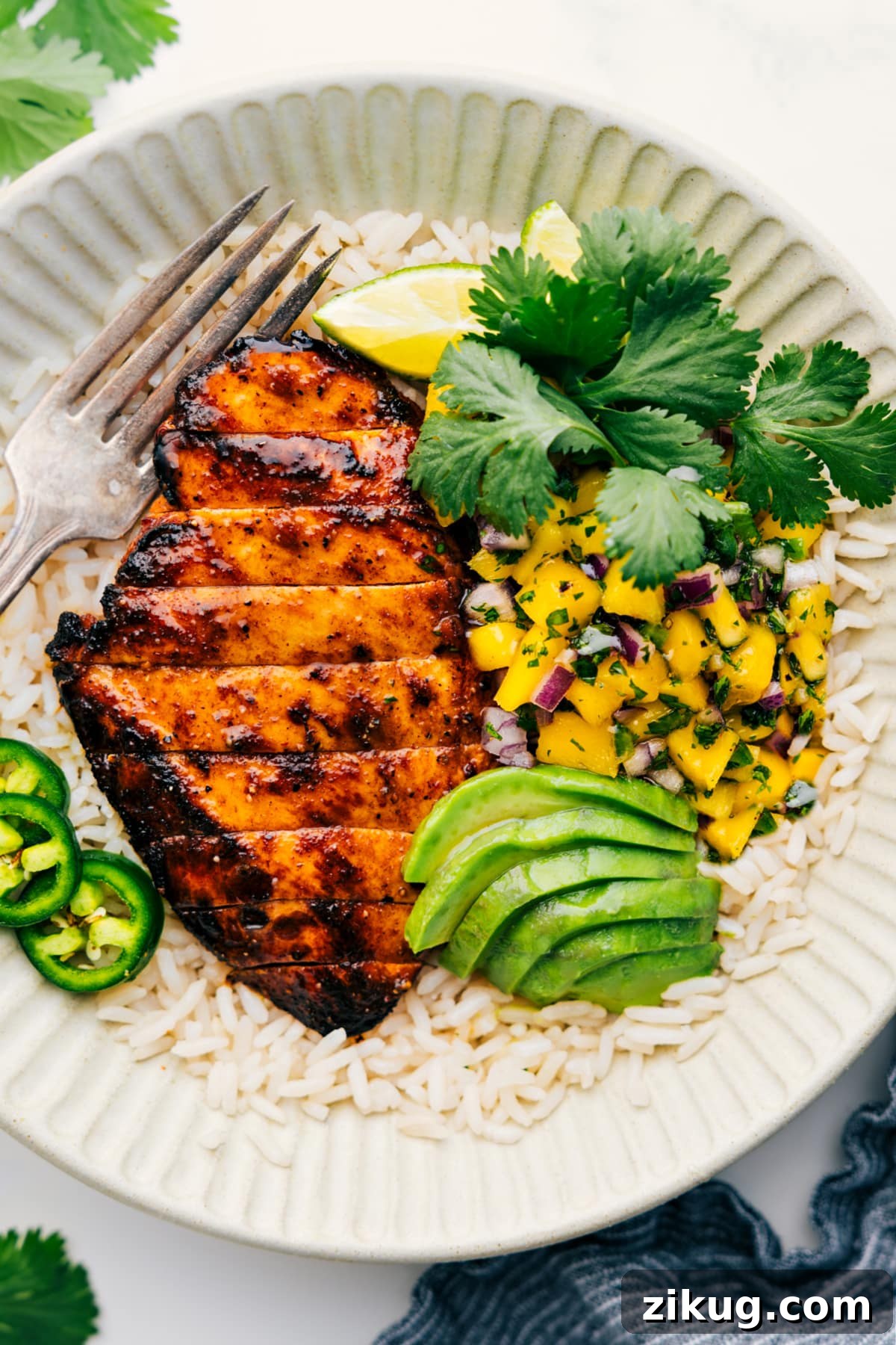 Mango Chicken Mango chicken with fresh mango salsa and avocado, one of the Best Recipes for Meal Prep.