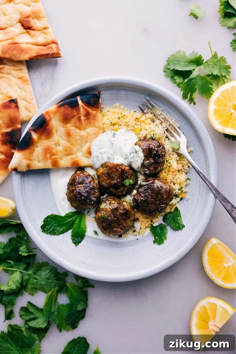 Beef Kofta Beef kofta meatballs served with vegetables and mint yogurt sauce.