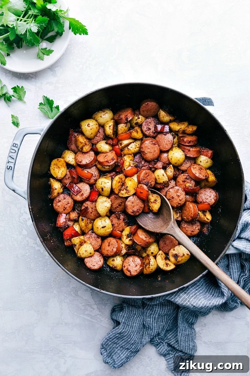 Sausage and Potatoes Skillet Sausage and potatoes skillet, one of the Best Recipes for Meal Prep, with peppers and herbs.