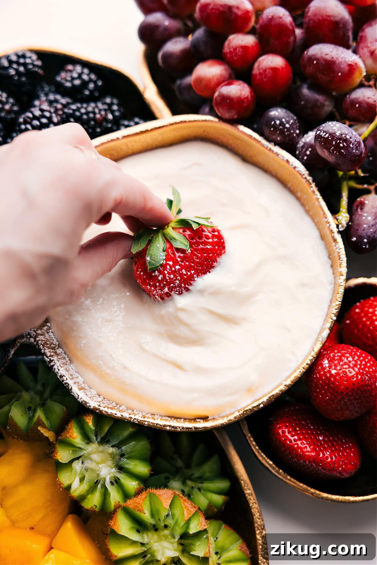 Cream Cheese Fruit Dip Recipe Creamy lime fruit dip served with a colorful assortment of fresh fruit.