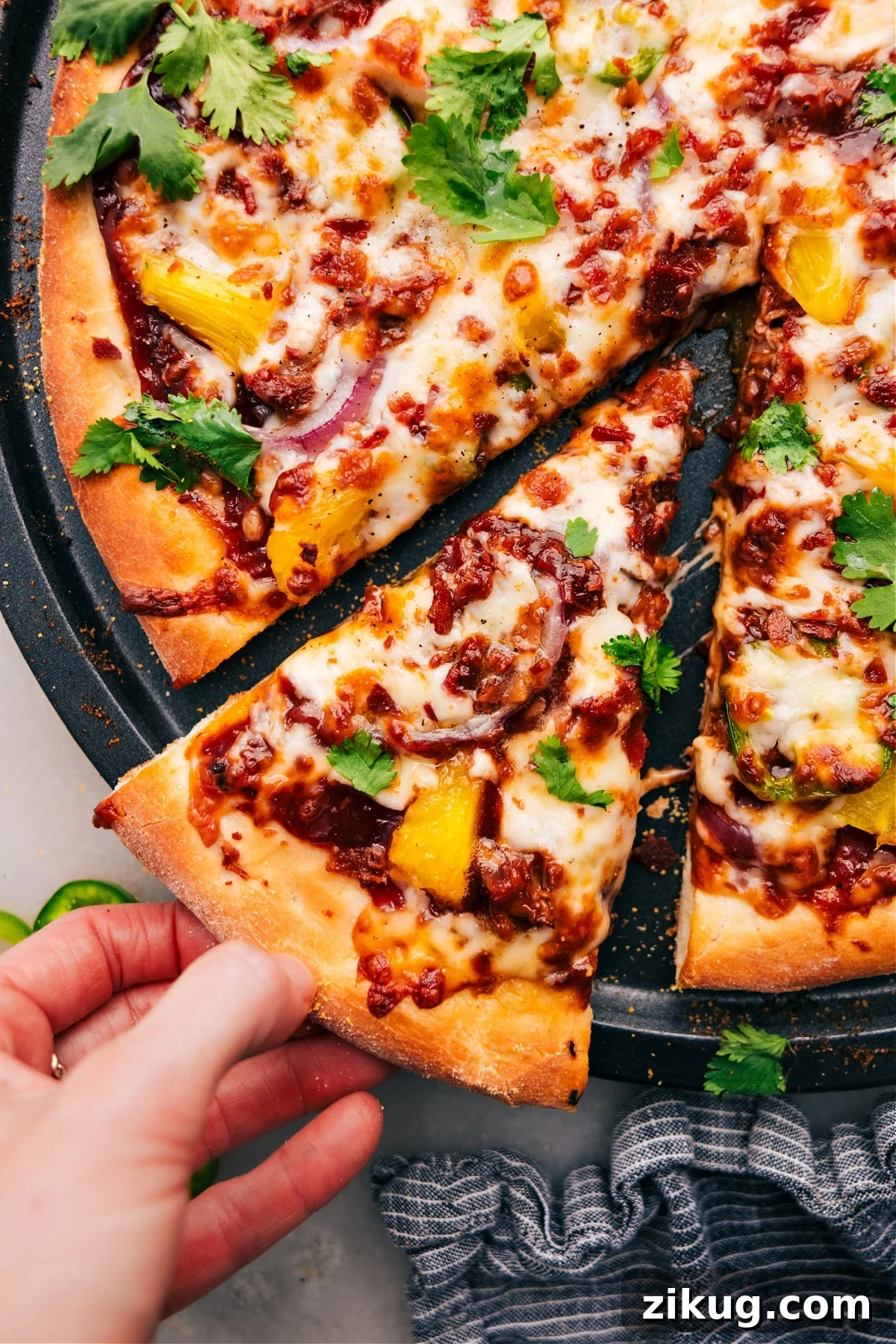 BBQ Chicken Pizza BBQ chicken pizza with pineapple, bacon, and melty cheese adds a fun option to easy recipes for kids.