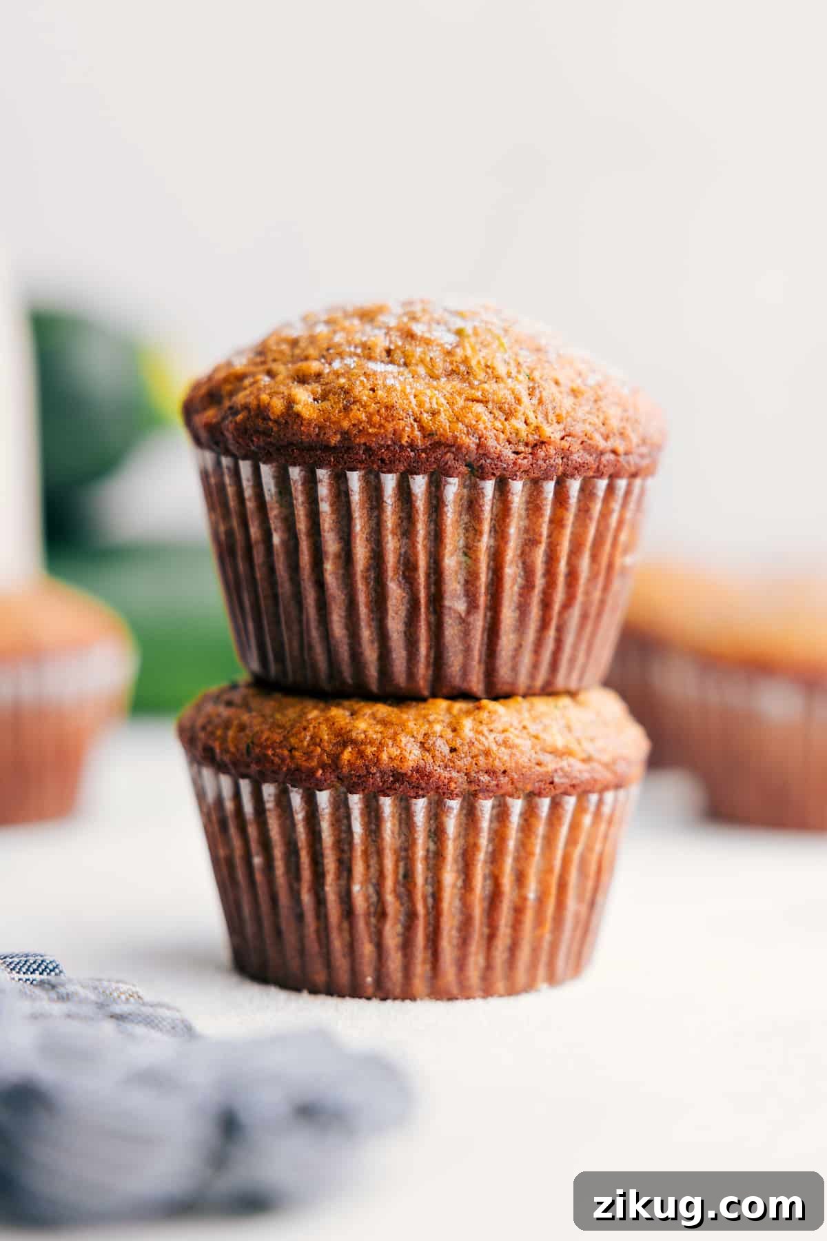 20-Minute Mongolian Ground Beef Banana zucchini muffins made with oats and Greek yogurt for easy recipes for kids at breakfast or snack time.