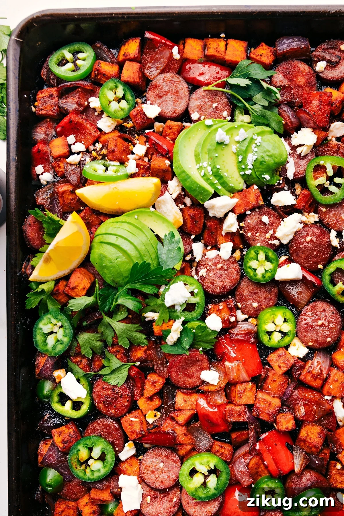 Crockpot Taco Met Hot honey sausage and roasted vegetables featured among healthy one pan meals.