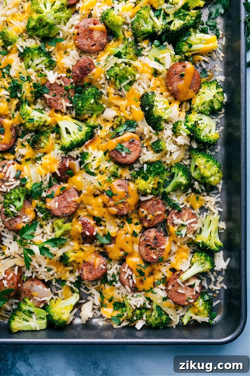 Beef Burrito Bowl Cheesy chicken sausage, broccoli, onions, and rice baked together on a sheet pan.