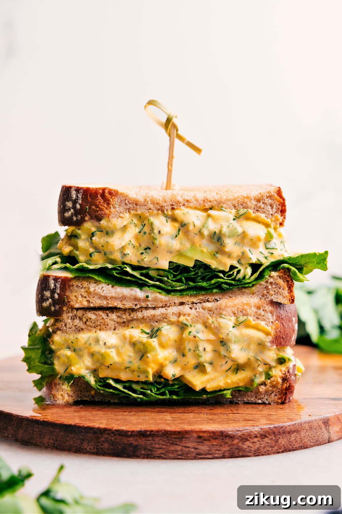 Cajun Chicken In The Crockpot Egg salad with creamy seasoned egg salad piled onto soft bread.