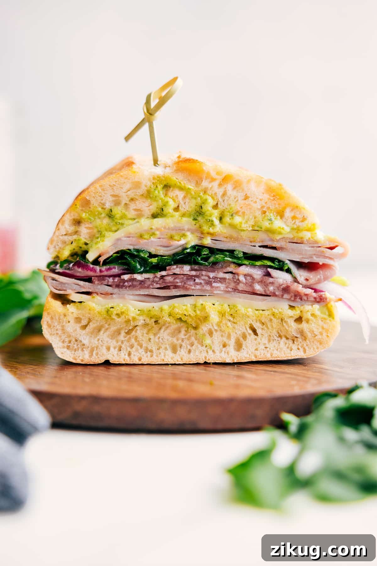 Low-Carb Burger Bowl Recipes Ciabatta sandwich stacked with deli meats, provolone, pickled onions, and dressed greens.