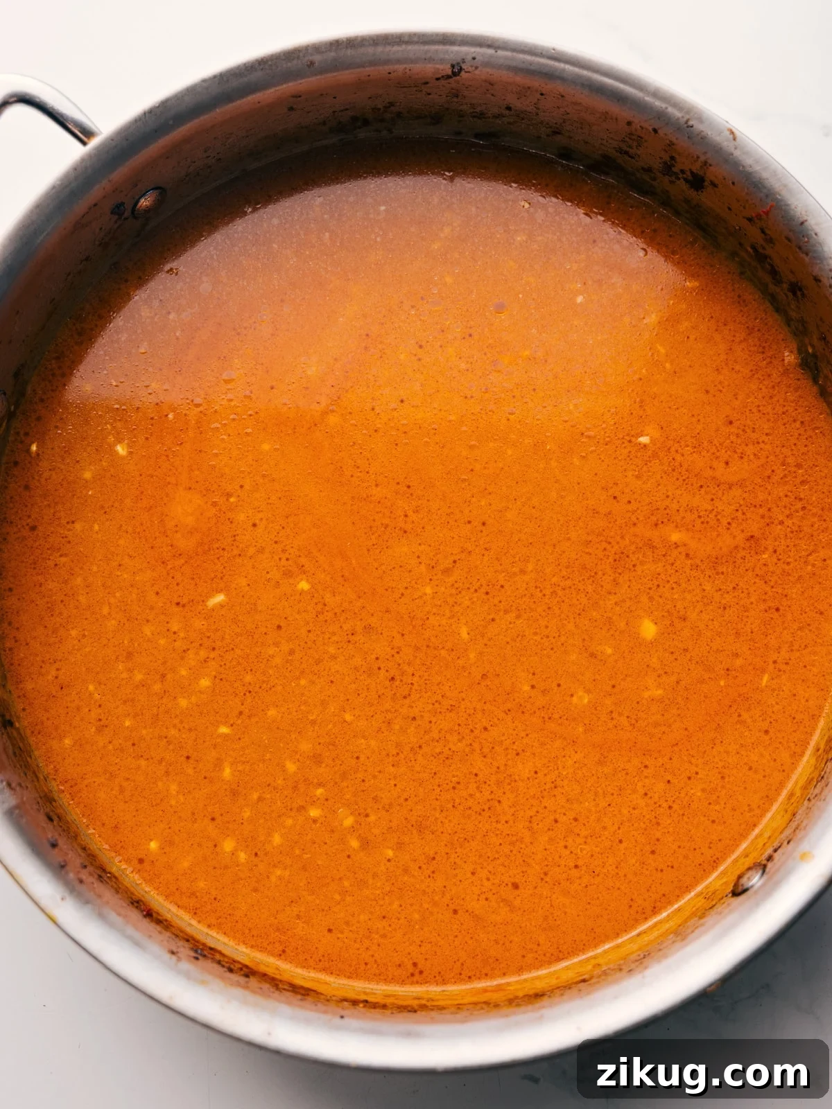 Fragrant Curry Broth for Soups and Noodles 6 The broth being whisked together in the same skillet the beef was browned in.