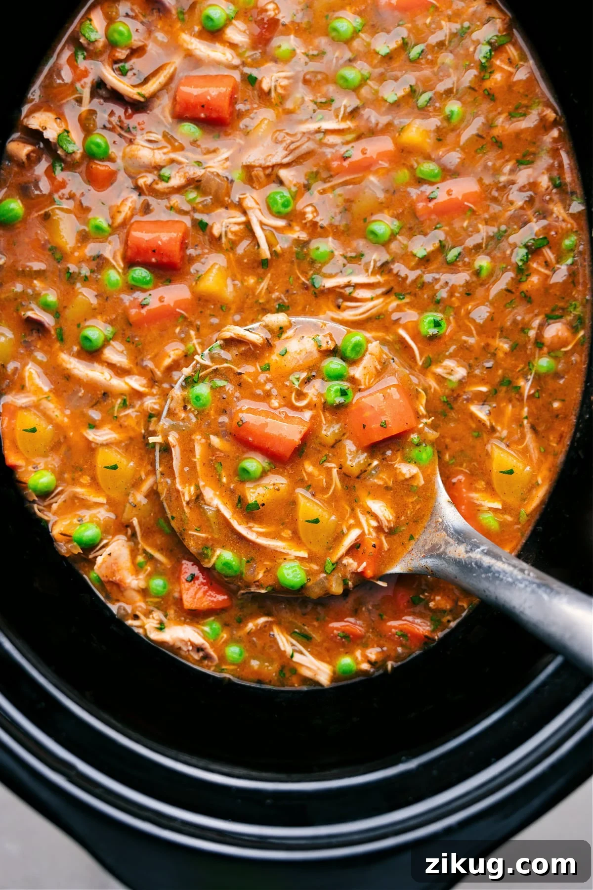 Crockpot Taco Met Hearty Crockpot Chicken Stew with tender chicken, vegetables, and a rich, savory broth.